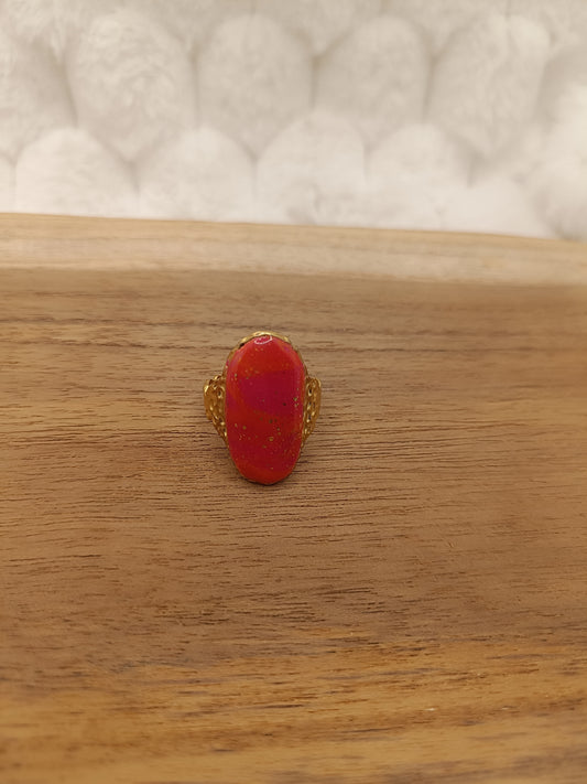 Bague doré et rouge orangé