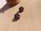 Clous d'oreilles " Rubis de minuit "