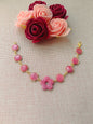 Bracelet doré & perles hexagonales rose