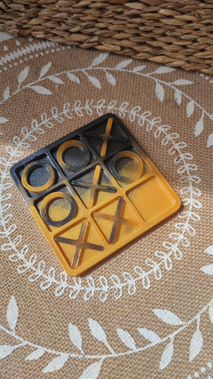 plateau de morpion en résine epoxy noir et orange