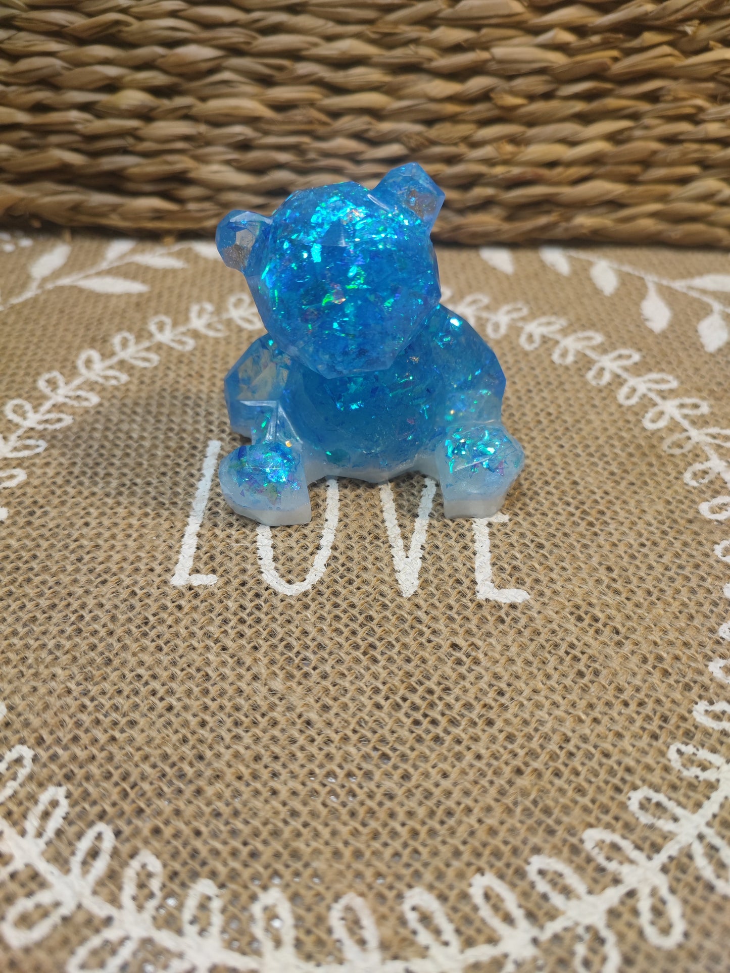 figurine ours bleu holographique et blanche